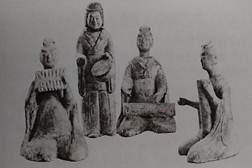 A picture containing text, sculpture, gallery, megalith

Description automatically generated